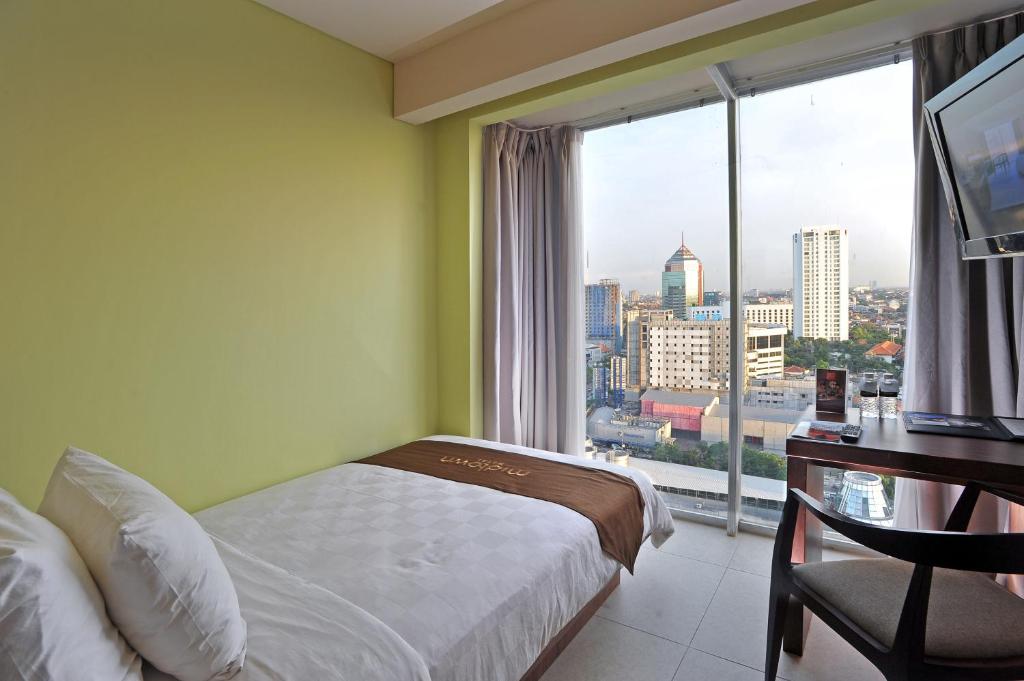 10 Potret Midtown Hotel Surabaya, Akomodasi Bintang Tiga Yang Bernuansa Mewah Mulai Rp414.000 4